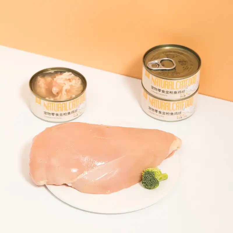 Can cats live on canned tuna and chicken?
